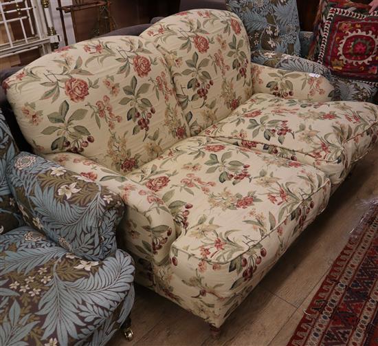 A Howard style upholstered two seater settee, W.150cm., D.110cm, H.80cm